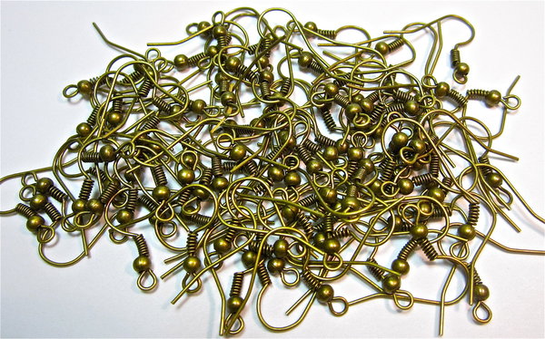 50 Stück Ohrhaken mit Spule in der Farbe Bronze. Geralin Gioielli